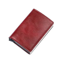 Cargar imagen en el visor de la galería, Hold anti-theft red vegan leather wallet with RFID/NFC protection, showcasing durable and handcrafted design