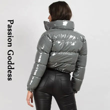 Cargar imagen en el visor de la galería, Back view of a shiny grey PU leather winter jacket, showcasing glossy vegan leather finish and stylish design.