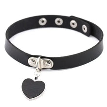 Cargar imagen en el visor de la galería, Black leather round pendant necklace with heart charm, featuring classic design and modern sophistication.
