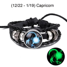 Cargar imagen en el visor de la galería, Capricorn zodiac leather bracelet with blue constellation design, woven band, and metallic accents for astrological style.