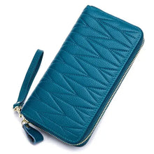 Cargar imagen en el visor de la galería, Teal leather female travel purse with zipper and wrist strap, ideal for organizing essentials like passport and cards in style.