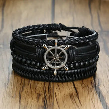 Cargar imagen en el visor de la galería, Vnox 4-piece vegan leather wrap bracelet set with zinc alloy accents and ethnic charm design on wooden background.