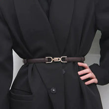 Cargar imagen en el visor de la galería, Elegant adjustable leather dress belt on person wearing a black coat, demonstrating sophistication and versatility.