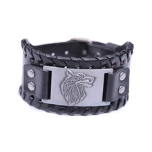 Load image into Gallery viewer, Vintage wide leather woven wolf head bracelet, symbolizing strength and independence, featuring intricately crafted wolf design.