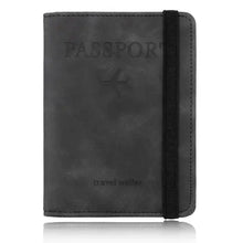 Cargar imagen en el visor de la galería, Leather travel wallet with RFID-blocking for secure passport storage.