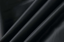 Load image into Gallery viewer, Close-up of black genuine leather fabric with smooth texture, perfect for men's bomber jackets.