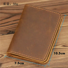 Load image into Gallery viewer, Vintage men's genuine leather credit card holder wallet with dimensions 10.5 x 7.5 cm, shown on a wooden surface.