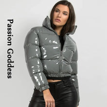 Cargar imagen en el visor de la galería, Woman wearing shiny gray PU leather winter jacket from Passion Goddess collection, showcasing chic and cozy style.