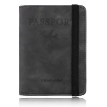 Cargar imagen en el visor de la galería, Leather RFID-blocking passport holder and travel wallet in black, offering stylish identity protection with secure card storage for travelers.