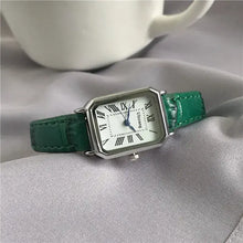 Cargar imagen en el visor de la galería, Retro Women's Classic Quartz Watch with Green Vegan Leather Strap on a Silky Fabric Background