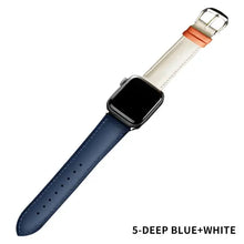 Cargar imagen en el visor de la galería, Deep blue and white leather band for Apple Watch displaying stylish contrast, shown with an orange accent and metallic clasp.