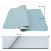 Cargar imagen en el visor de la galería, Light blue leather suede desk mat showing front and back detail enhancing workspace elegance and protection.