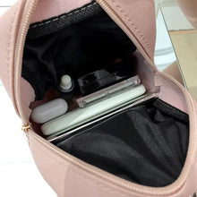 Cargar imagen en el visor de la galería, Inside view of mini backpack for women, displaying spacious pockets with phone, accessories, and PU leather material.