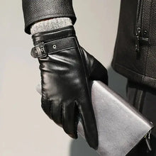 Charger l'image dans la galerie, Men's winter leather gloves in black, featuring a stylish buckle, perfect for warmth and sophistication, holding a wallet.