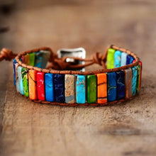 Cargar imagen en el visor de la galería, Leather wrap bracelet with multi-color natural stone tube beads, showcasing a bohemian style and chakra balancing energy.