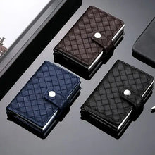 Load image into Gallery viewer, Three woven leather RFID cardholders in black, blue, and brown, designed for stylish and secure card protection on a reflective surface.