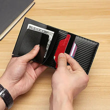 Cargar imagen en el visor de la galería, Sleek RFID black trifold leather wallet with cards and cash, showcasing its compact and functional design for everyday essentials.