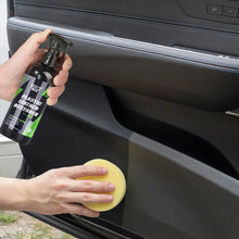 Cargar imagen en el visor de la galería, Car interior leather conditioner applied to door panel for UV protection and restoration using sponge
