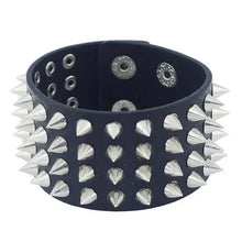 Cargar imagen en el visor de la galería, Bold faux leather bracelet with silver spikes for a punk-inspired look, perfect for adding edgy style to any fashion ensemble.