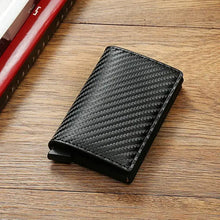 Cargar imagen en el visor de la galería, RFID Black Magic Trifold Vegan Leather Slim Mini Wallet on a Wooden Surface