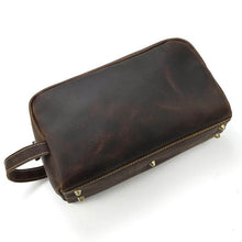 Cargar imagen en el visor de la galería, The Wanderer Toiletry Bag | Genuine Leather Toiletry Bag in dark brown leather, durable design with sturdy handle and metal feet.