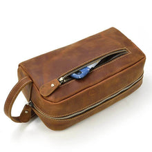 Cargar imagen en el visor de la galería, The Wanderer Toiletry Bag | Genuine Leather Toiletry Bag with durable zippers, front pocket, and handle for travelers.