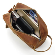 Cargar imagen en el visor de la galería, The Wanderer Toiletry Bag | Genuine Leather Toiletry Bag with open view showing spacious compartments filled with travel essentials.