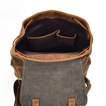 Charger l'image dans la galerie, Interior view of The Hagen Backpack | Vintage Leather Backpack, showcasing spacious compartments and genuine leather finish.