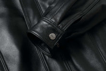 Load image into Gallery viewer, Close-up of REED Men's American Style Bomber Genuine Leather Jacket cuff detailing, showcasing premium genuine leather texture and sleek design.
