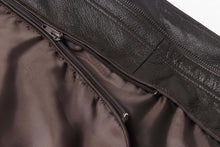 Load image into Gallery viewer, Close-up of REED men's bomber jacket showcasing genuine leather texture with detailed zippers and lining.