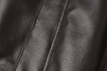 Load image into Gallery viewer, Close-up of REED Men's genuine leather jacket featuring a sleek, luxurious surface with a classic American bomber design.