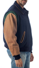 Cargar imagen en el visor de la galería, REED Men's premium blue leather letterman varsity jacket made in USA, shown on model, showcasing stylish design and quality craftsmanship.
