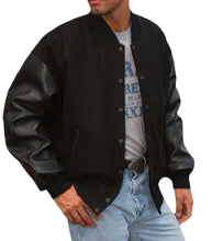 Cargar imagen en el visor de la galería, REED Men's Premium Varsity Black Leather Wool Jacket, stylish and warm, made in USA, featuring quilted lining and inside pocket.