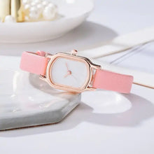 Charger l'image dans la galerie, Oval Dial Retro Watch with pink strap and vintage-inspired design, showcasing timeless elegance and sophistication on a white surface.