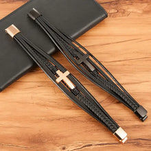 Load image into Gallery viewer, Two cross leather bracelets on wood surface, vegan and imported, ideal gift for loved ones, featuring heartfelt message.