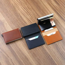 Cargar imagen en el visor de la galería, Vegan leather credit card holders with RFID blocking, displayed on a wooden surface for stylish and secure card storage.