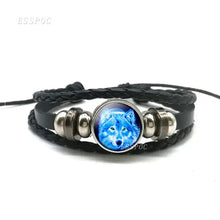 Cargar imagen en el visor de la galería, Handcrafted leather bracelet featuring a blue wolf and full moon design, showcasing high-quality craftsmanship and style.