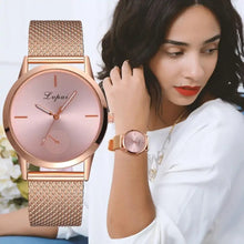 Load image into Gallery viewer, Woman wearing a trendy fashion watch with a rose gold band and face, showcasing modern elegance and style.