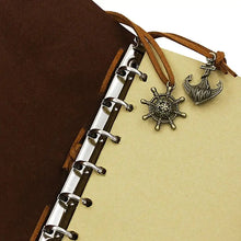 Cargar imagen en el visor de la galería, Anchor-faux leather cover notebook with anchor and wheel charms, showcasing durability and elegance for capturing thoughts in style.