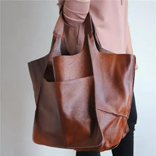 Cargar imagen en el visor de la galería, Retro luxury PU leather shoulder bag in brown, styled as a casual tote, featuring vegan leather and ample space for essentials.
