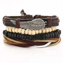 Charger l'image dans la galerie, Multilayer leather bracelet with wing charm, wood beads, and colorful cords for stylish and durable wrist accessory.