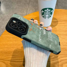 Cargar imagen en el visor de la galería, Person holding a green luxury leather sneaker phone case with Starbucks cup in background