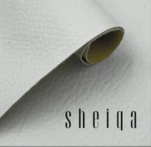 Charger l'image dans la galerie, High-quality white leather sheet with subtle texture, showcasing luxury material for upholstery, fashion, and craft projects.