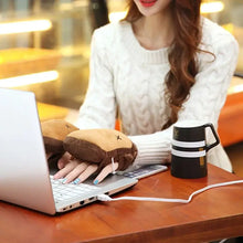 Charger l'image dans la galerie, Woman using winter heated gloves connected to a laptop, showcasing cozy warmth and adjustable heat settings. Coffee mug nearby on table.
