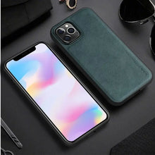 Load image into Gallery viewer, Luxury leather iPhone case with hybrid protection for style and durability, featuring a sleek design in dark green color.