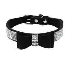 Cargar imagen en el visor de la galería, Elegant black leather pet collar with rhinestone bowknot, adjustable for puppies and cats, offering style and comfort.