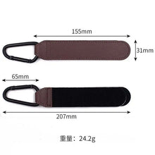 Cargar imagen en el visor de la galería, PU leather baby stroller hooks with dimensions and weight, showing 360-degree rotation feature for convenient bag attachment.