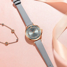 Cargar imagen en el visor de la galería, Classic Clock Leather Watch with quartz movement and water-resistant design, featuring a leather strap and elegant clockface for women.