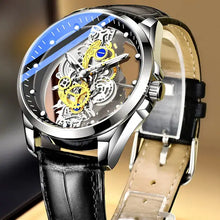 Load image into Gallery viewer, Skeleton Vintage Men's Watch with stainless steel band and open-face dial showcasing intricate gears against a leather background.