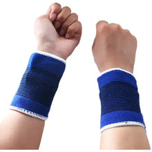 Cargar imagen en el visor de la galería, Elastic blue wristbands on two hands, providing support and comfort during physical activities.